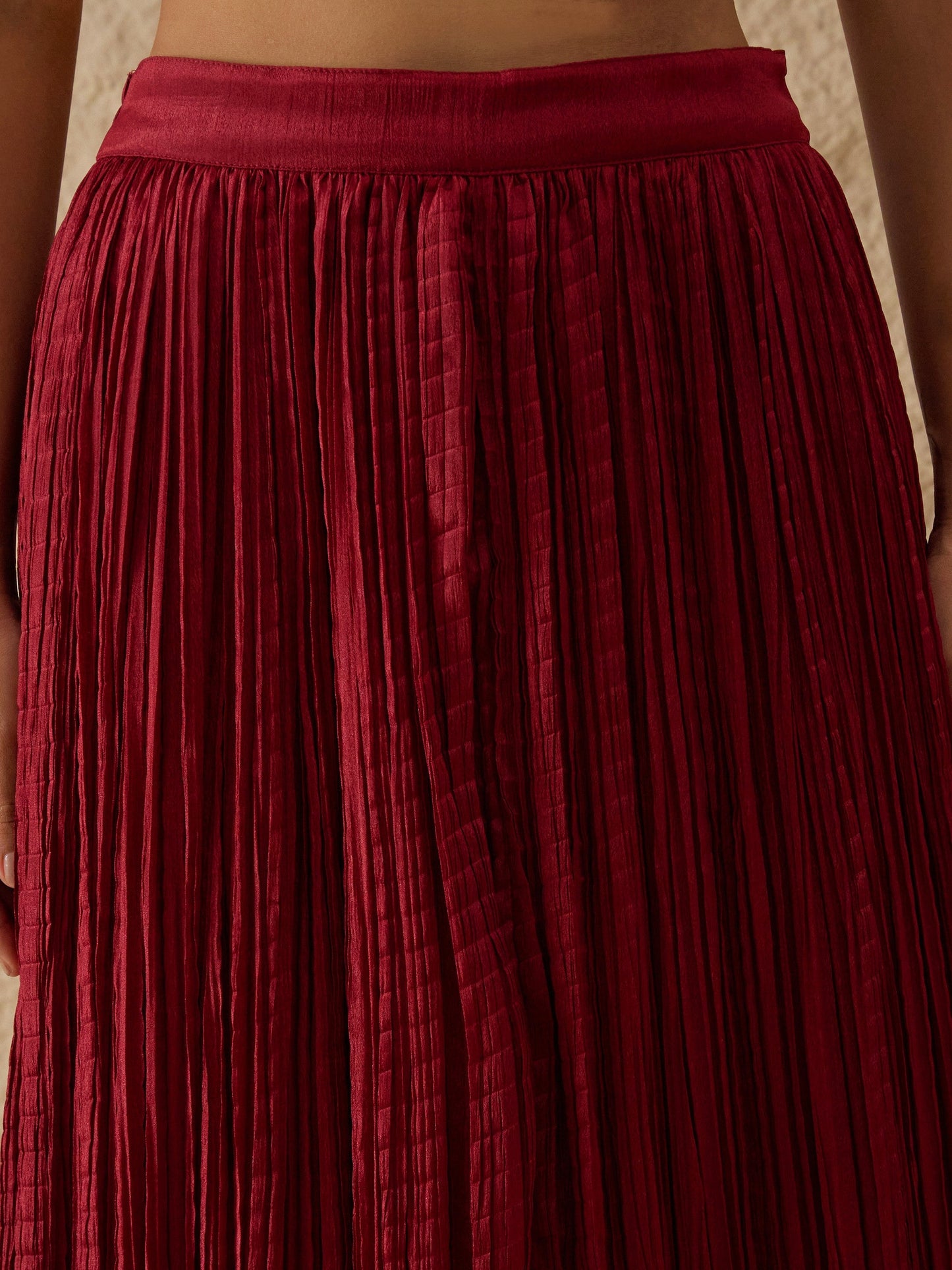 Women Maroon Velvet Sleeveless Top With Pleated Skirt