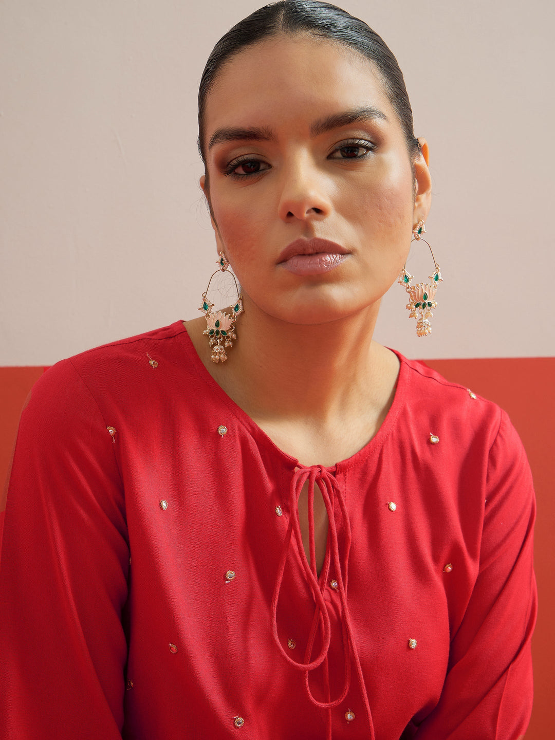 Women Red All Over Embroidered Short Kurti With Pharsi Salwar