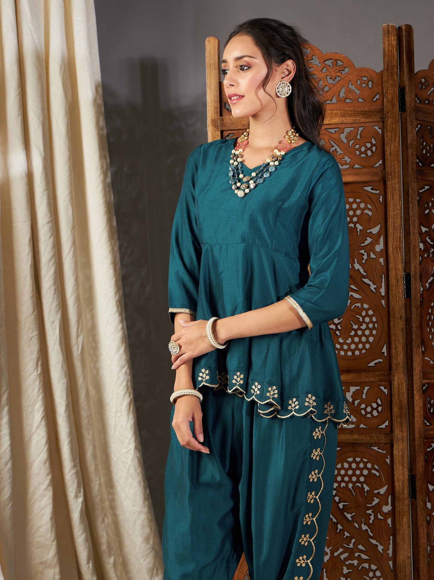 Teal Zari Embroidered Peplum Top