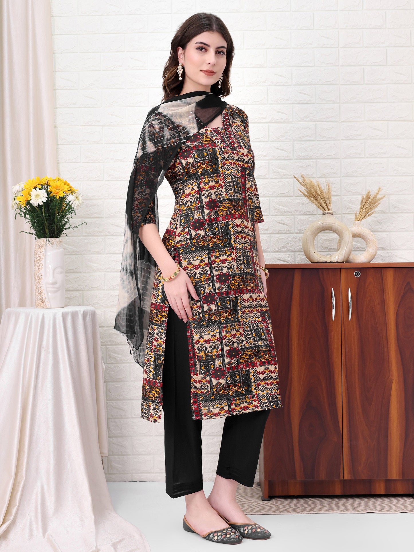 Multi Rayon Self Design Kurta Sets