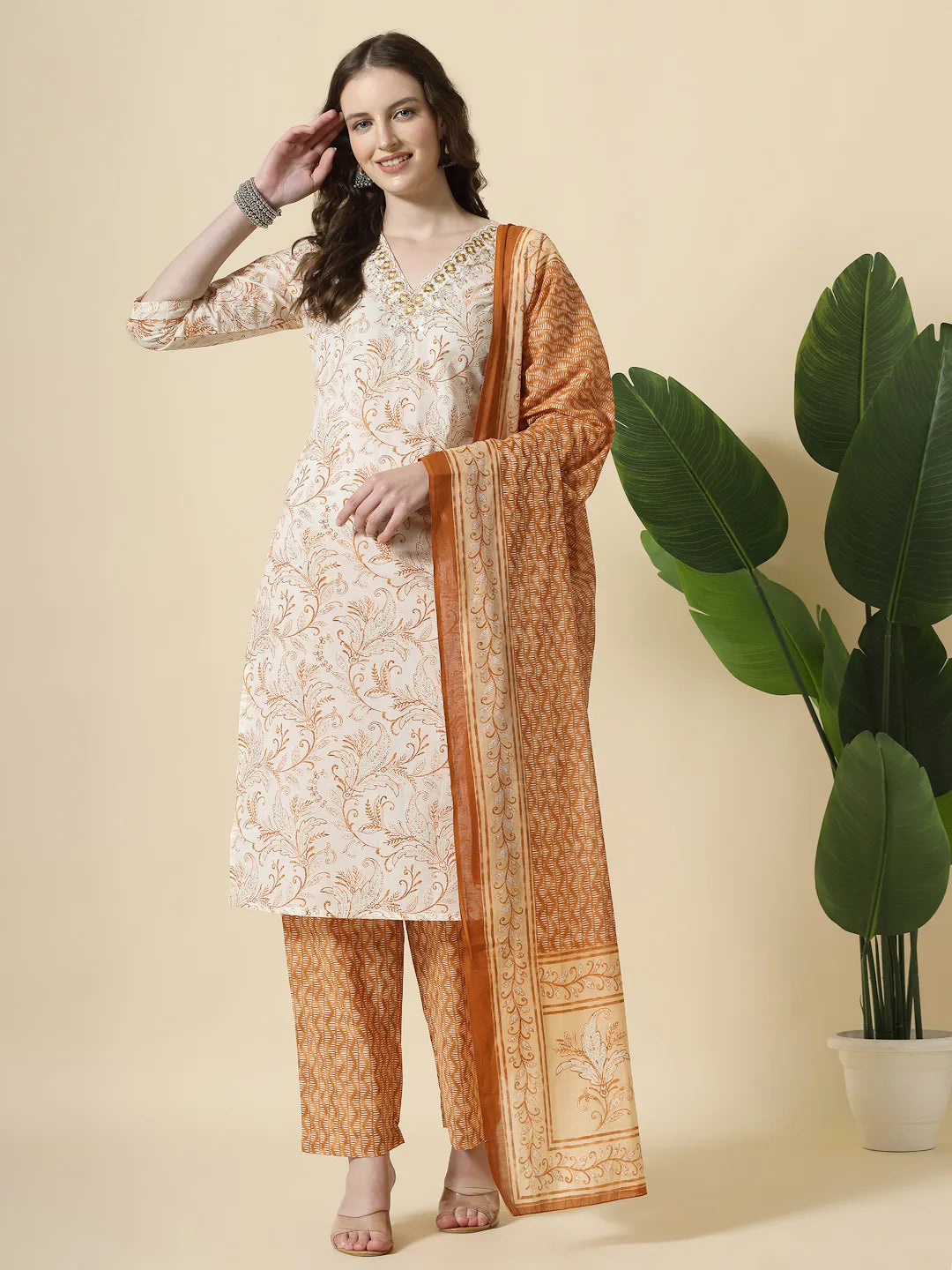 Women's Rust Cotton Rust Pure Cotton Paisley Thread Work Kurta Dupatta Pant Set by Yufta, suitable for wholesale buyers, boutiques, retailers, resellers and bulk fashion orders from Trendphoria