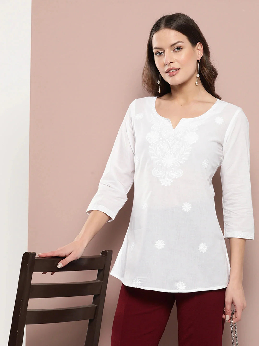 Women's White Cotton White Floral Chikankari Embroidered Pure Cotton Top by Yufta, suitable for wholesale buyers, boutiques, retailers, resellers and bulk fashion orders from Trendphoria