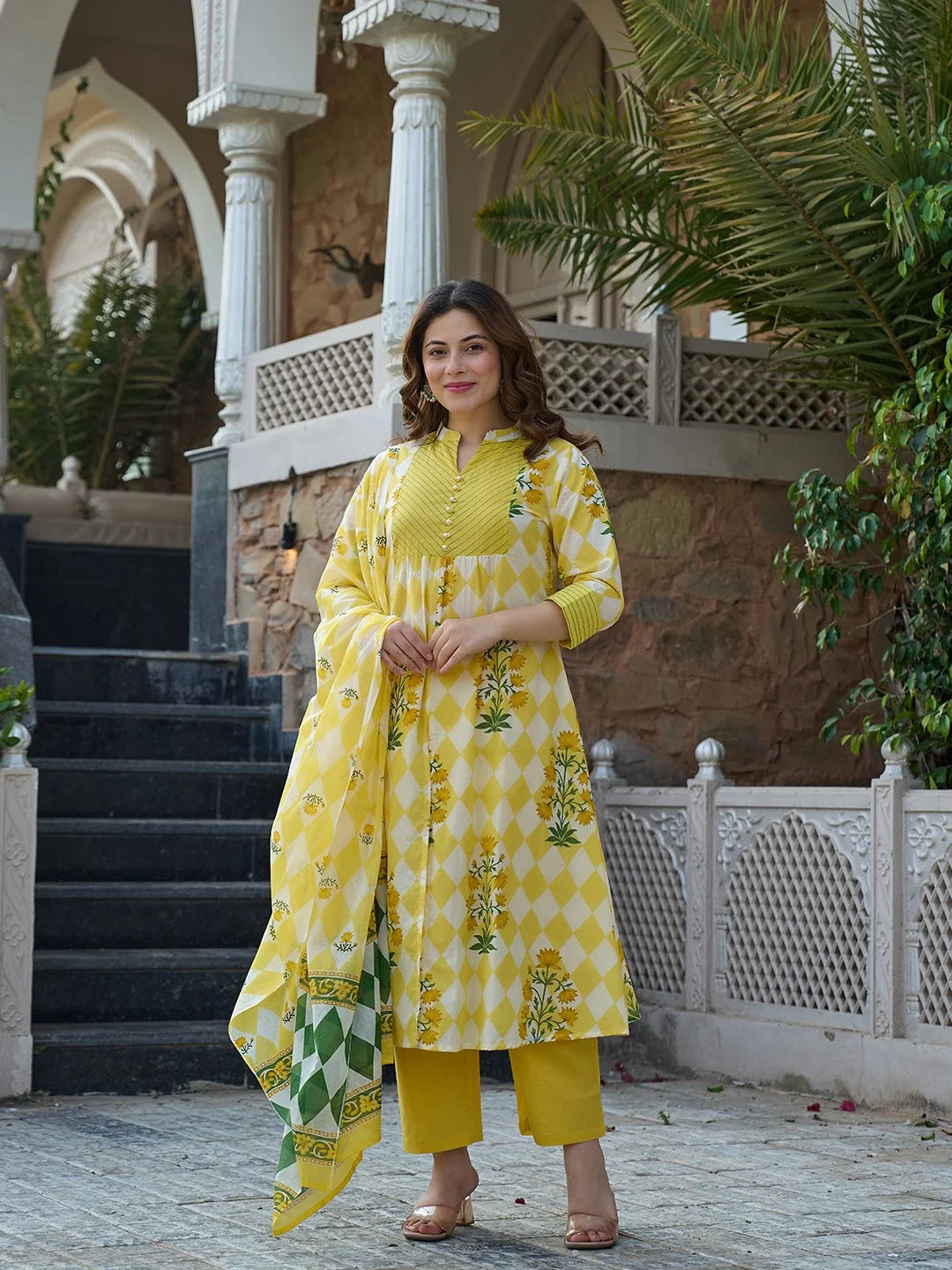 Yellow Floral And Geometric A-Line Button Yoke Kurta Trouser Dupatta Set