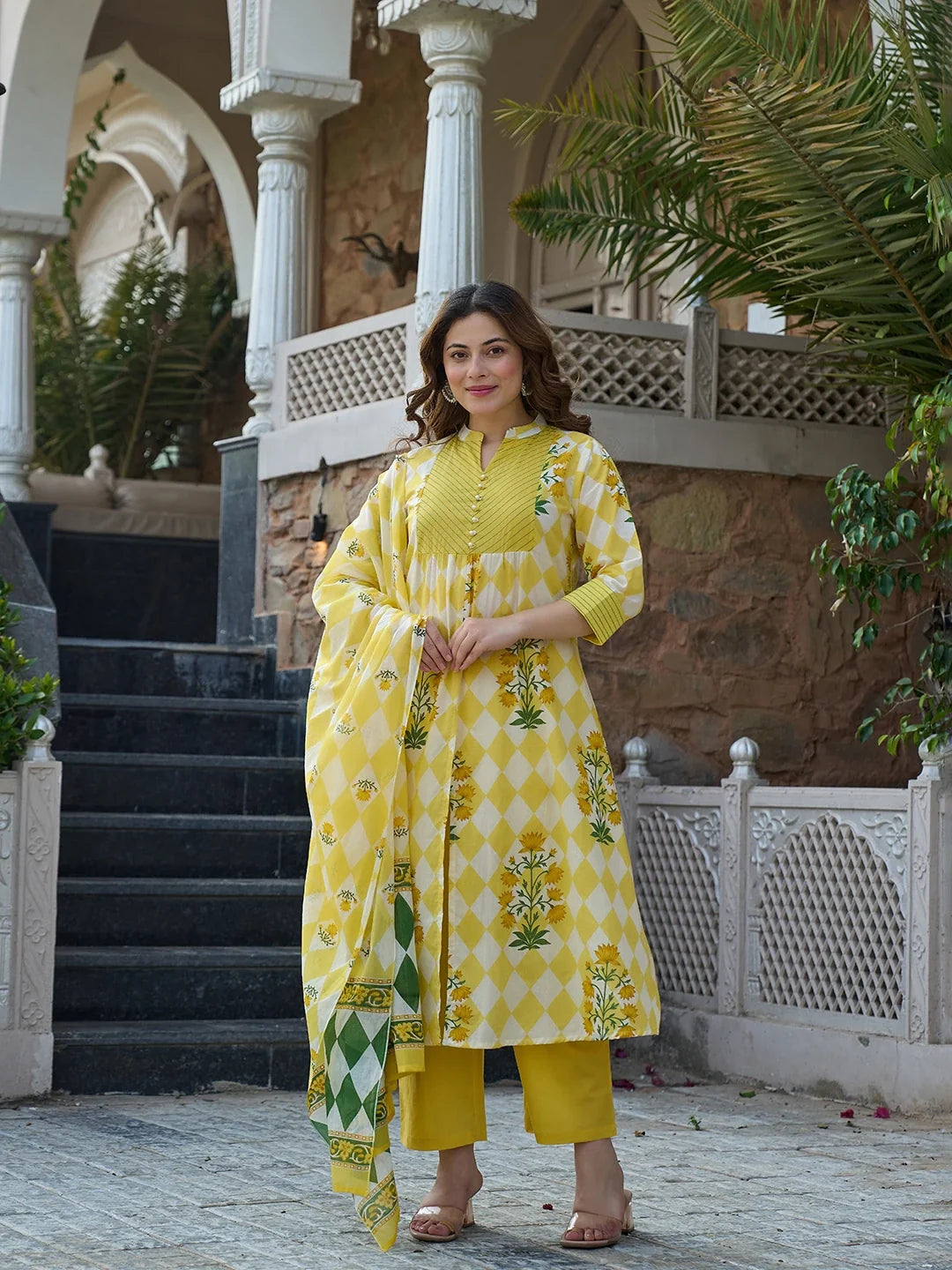 Yellow Floral And Geometric A-Line Button Yoke Kurta Trouser Dupatta Set