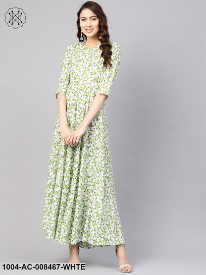 White And Green Floral Printed Round Neck 3/4Th Sleeves Flared Maxi With Deep Back And Tassels Detailing