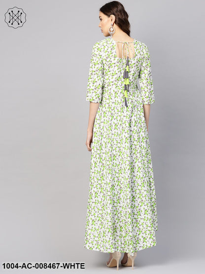 White And Green Floral Printed Round Neck 3/4Th Sleeves Flared Maxi With Deep Back And Tassels Detailing