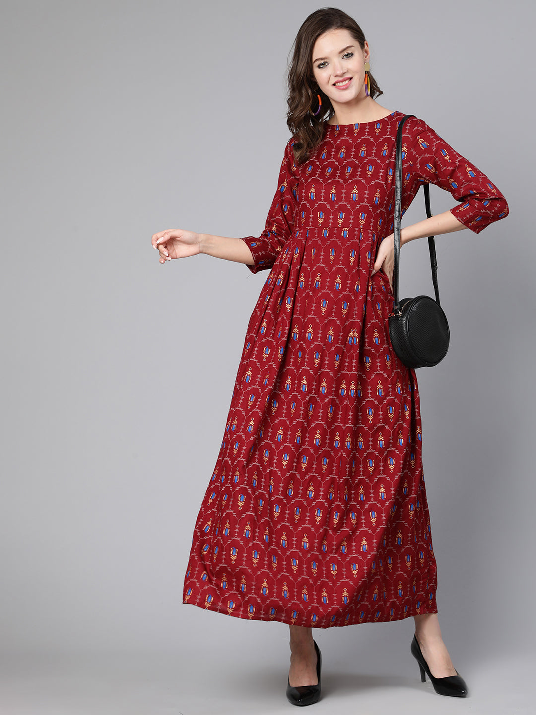 Maroon Printed Flared Dress With Three Quarter Sleeves
