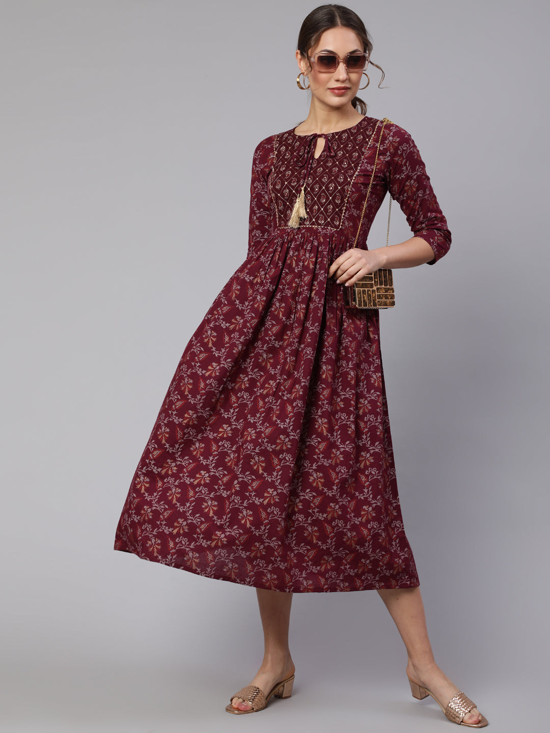 Burgundy Printed Flared Dress With Three Quarter Sleeves