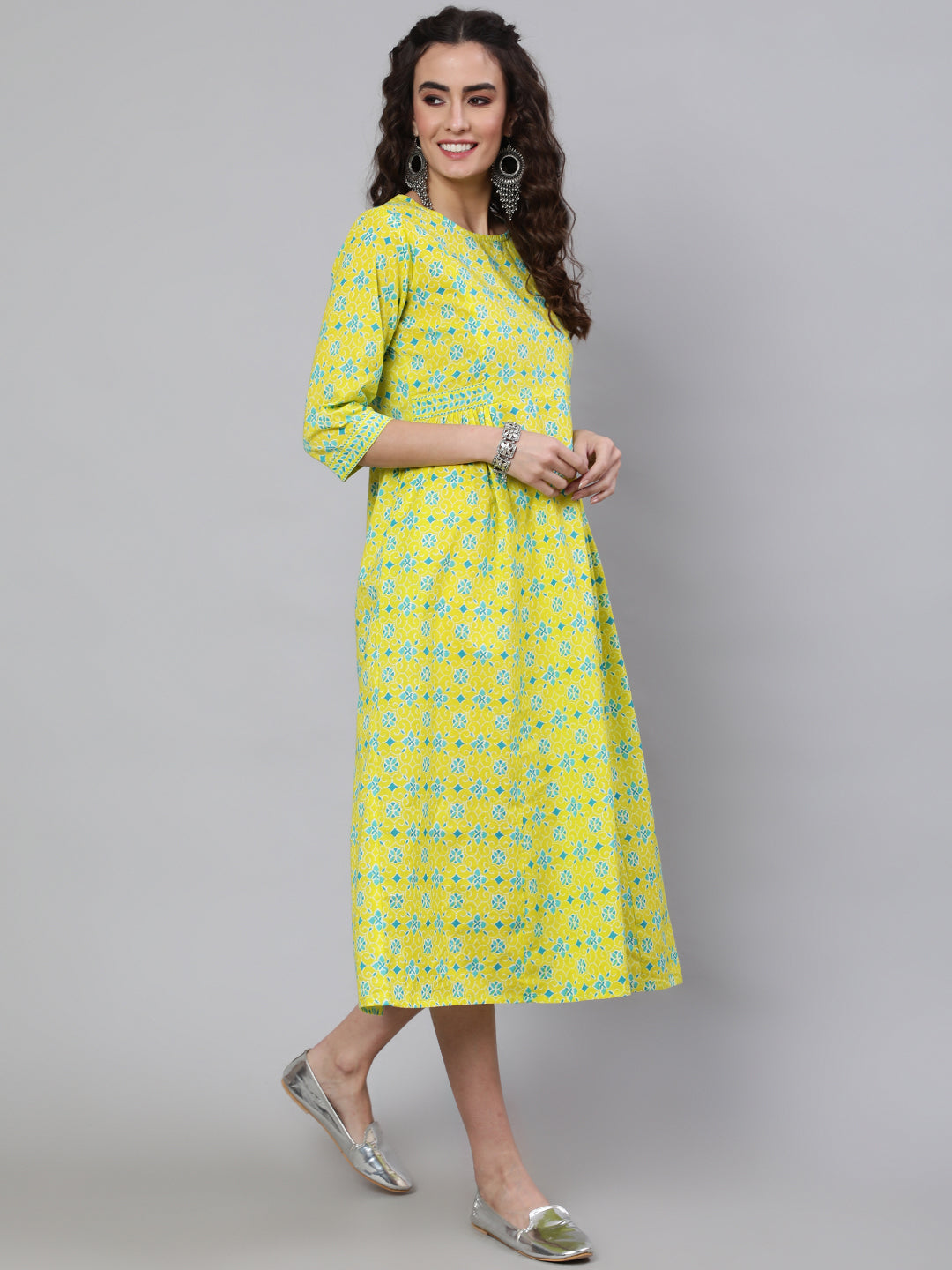 Yellow Ethnic Printed Flared Dress With Three Quarter Sleeves