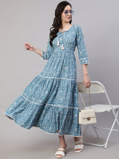 Blue Ethnic Printed Tired Dress With Tie Up Neck