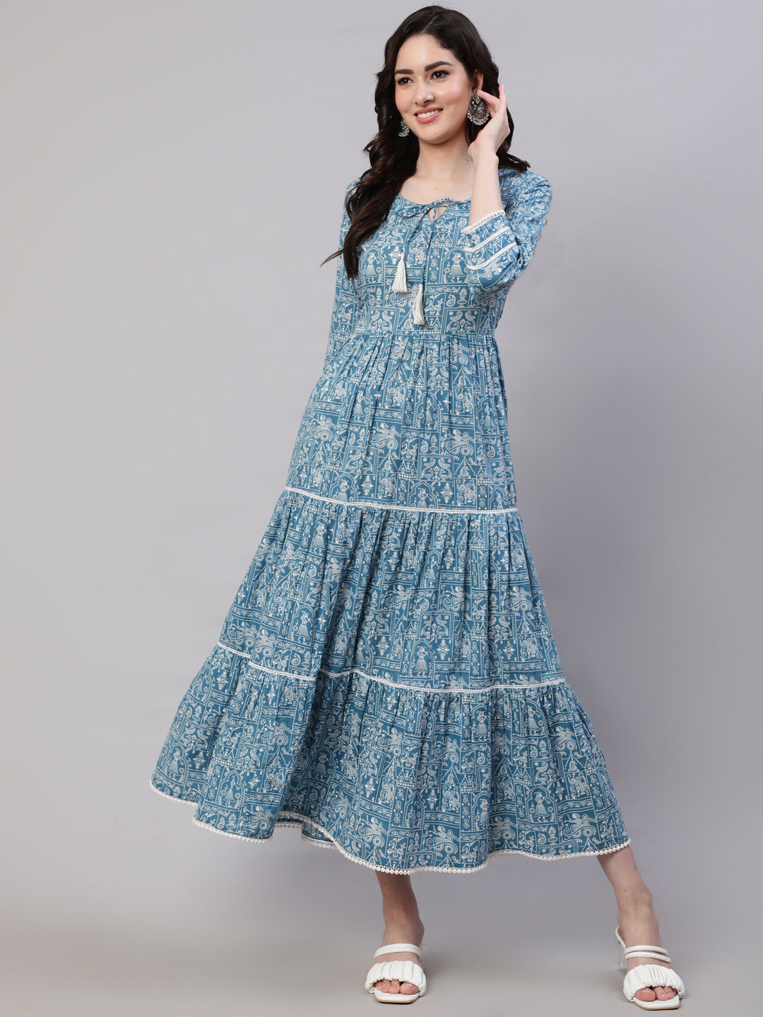 Blue Ethnic Printed Tired Dress With Tie Up Neck
