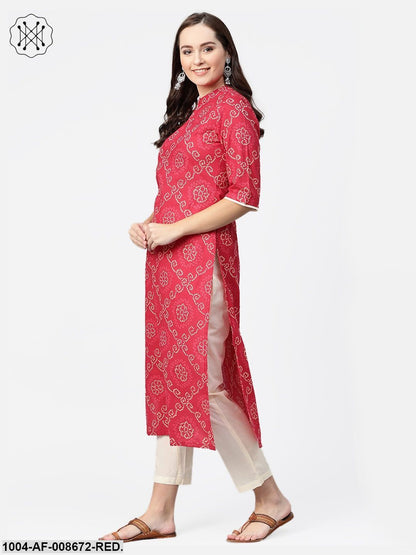 Red Bandhni printed kurta with solid cream pants