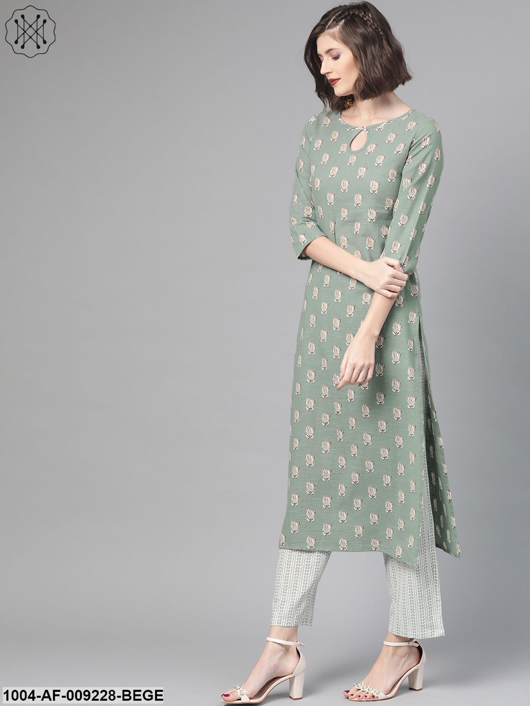 Women Green & Beige Straight Quirky Printed Kurta And Trousers Set