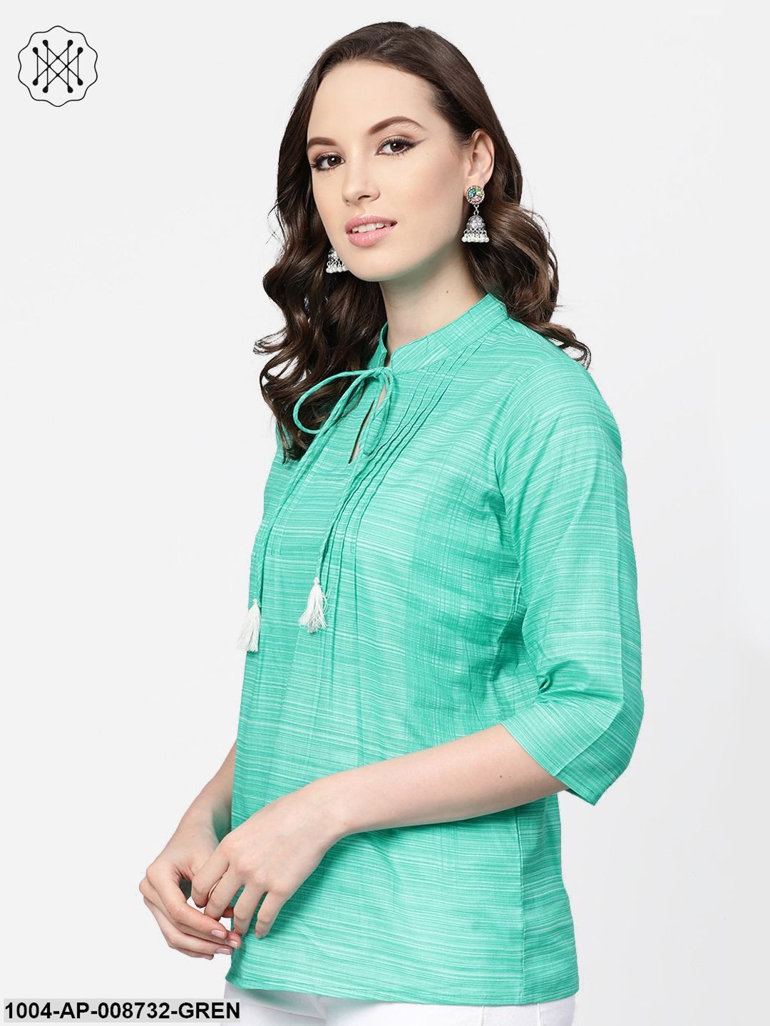 Solid Green self printed top with Dori work at yoke