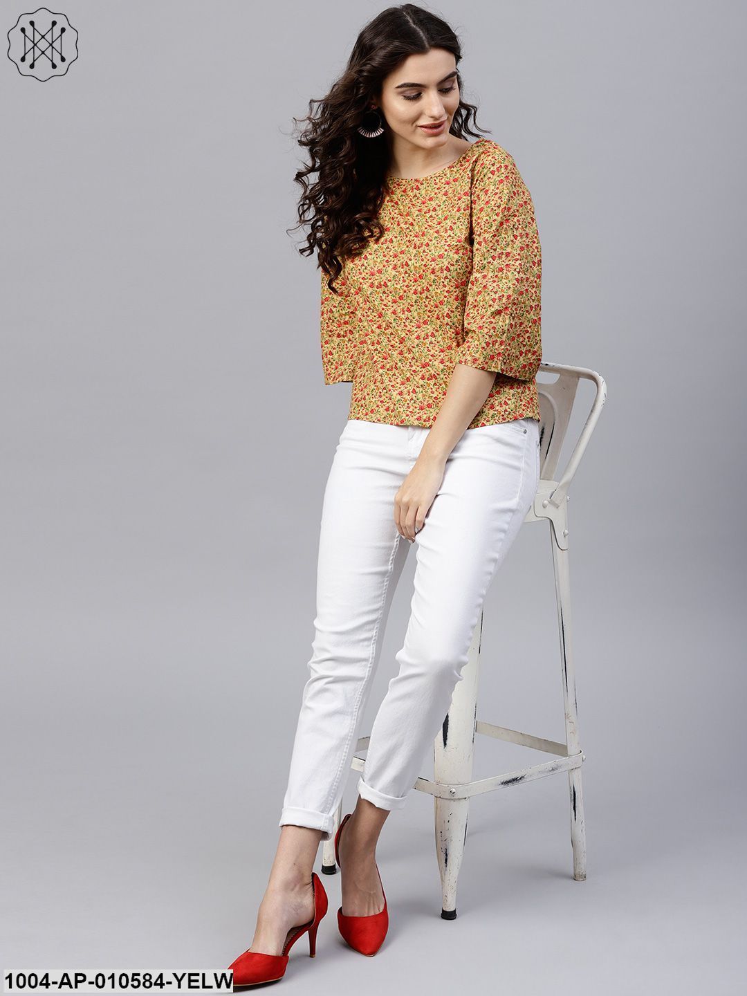 Multi Printed Top With Round Neck And 3/4 Flared Sleeves