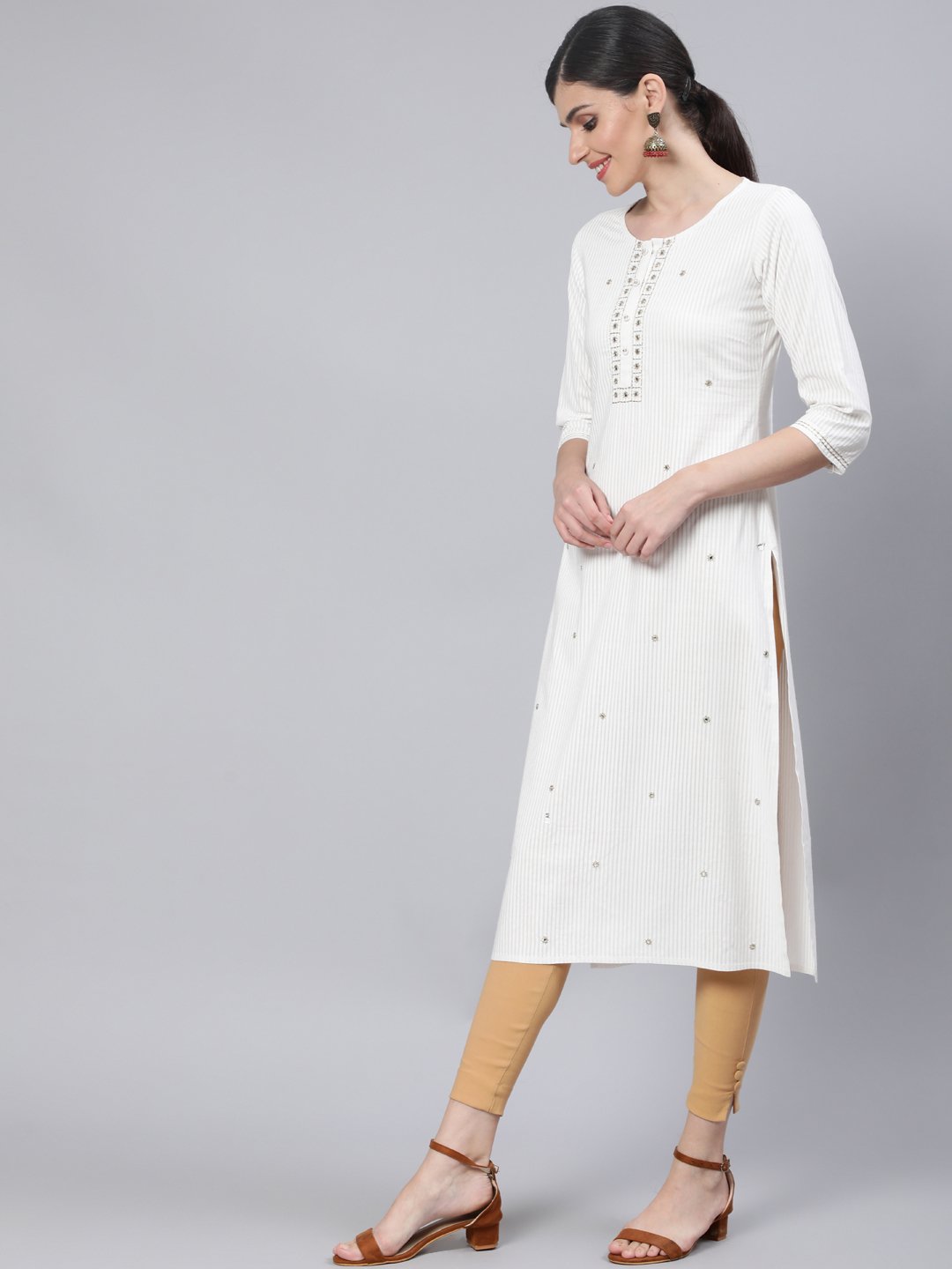 Women Off White Embroidered Straight Kurta with Three Quarter Sleeves