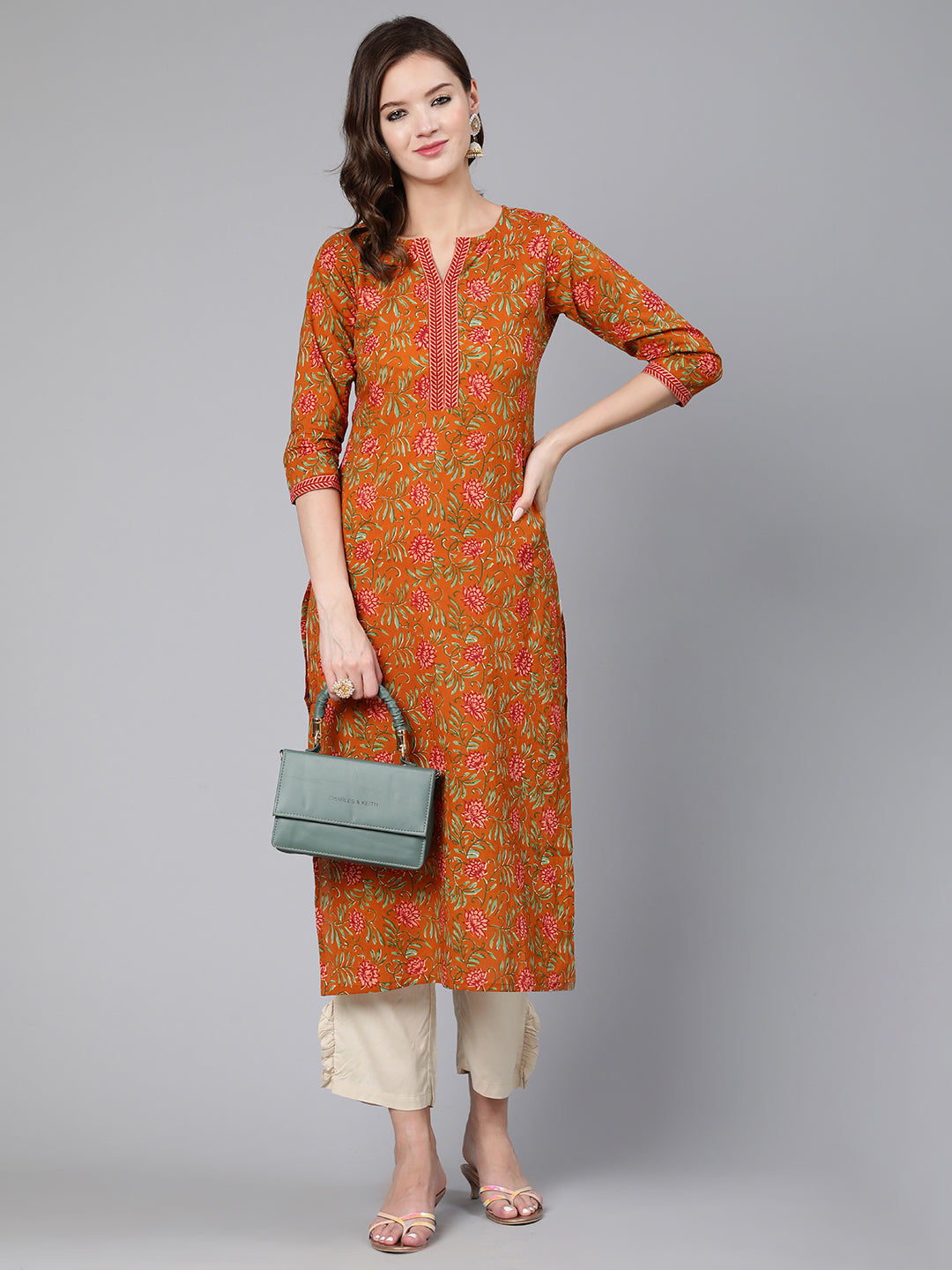 Mustard Floral Printed Straight Kurta With Three Quarter Sleeves