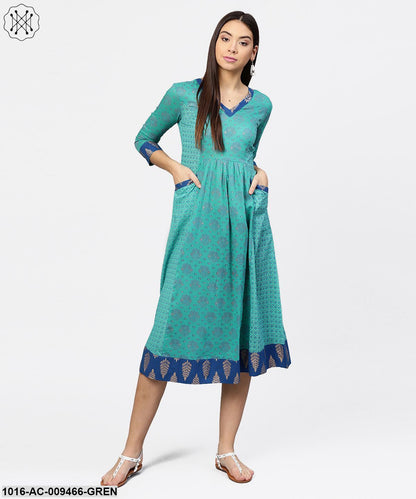 Printed V-Neck Panelled With Patch Pockets And 3/4Th Sleeved Maxi Dress