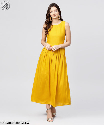 Bright Yellow Rayon A-Line Box Pleated Maxi With Attached Jacket Till Yoke And Emblished With Tassels