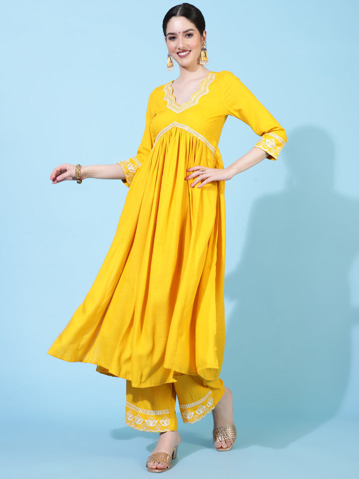 Rayon  Calf Length Solid Flared 3/4 Sleeve V-Neck Kurta Bottom Set
