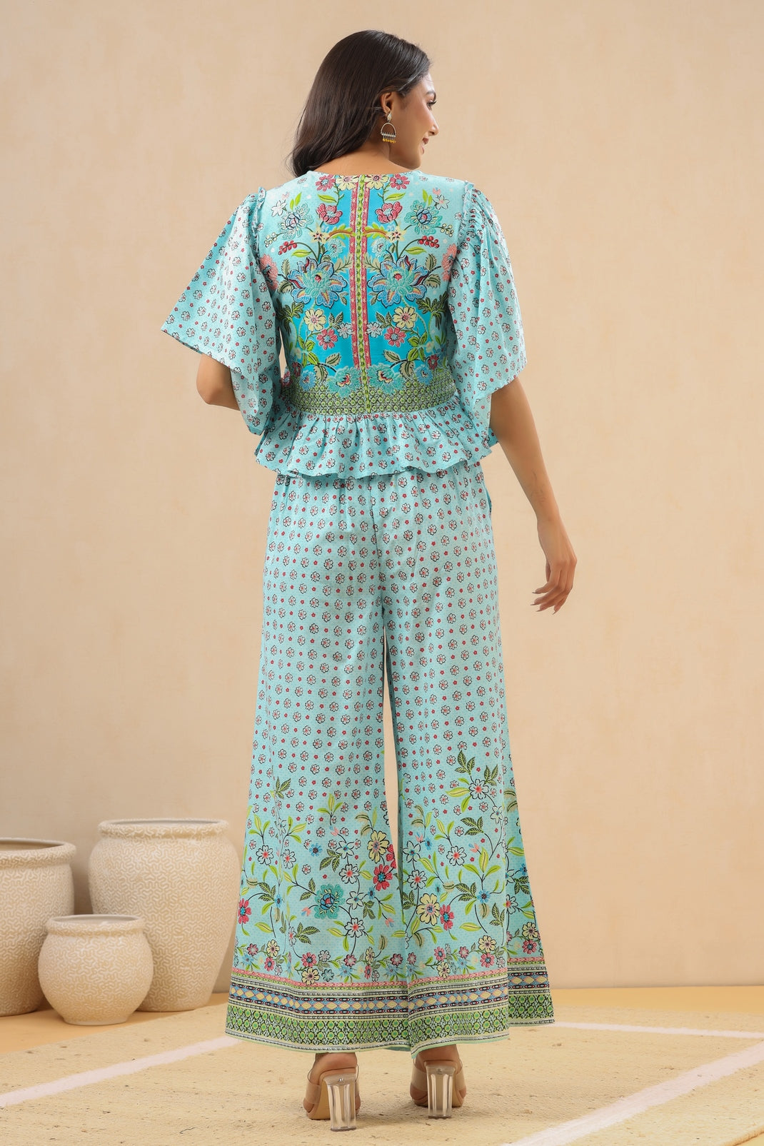Women`s Skyblue Rayon Printed Peplum Clothing Set