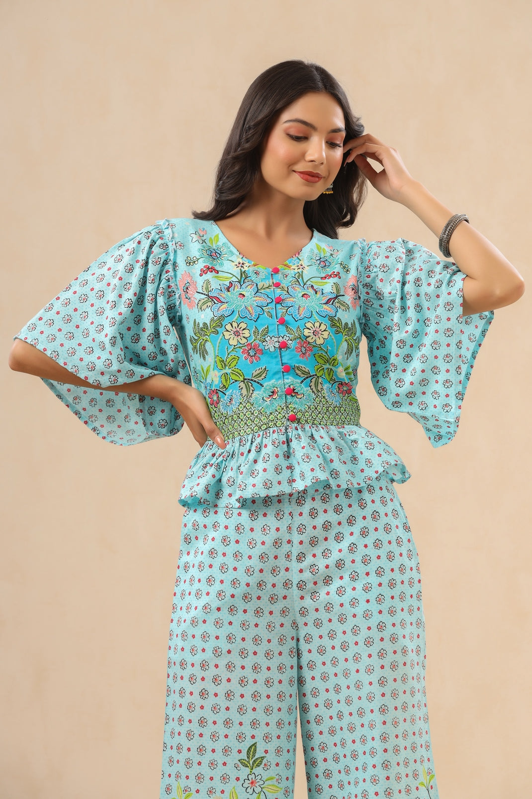 Women`s Skyblue Rayon Printed Peplum Clothing Set