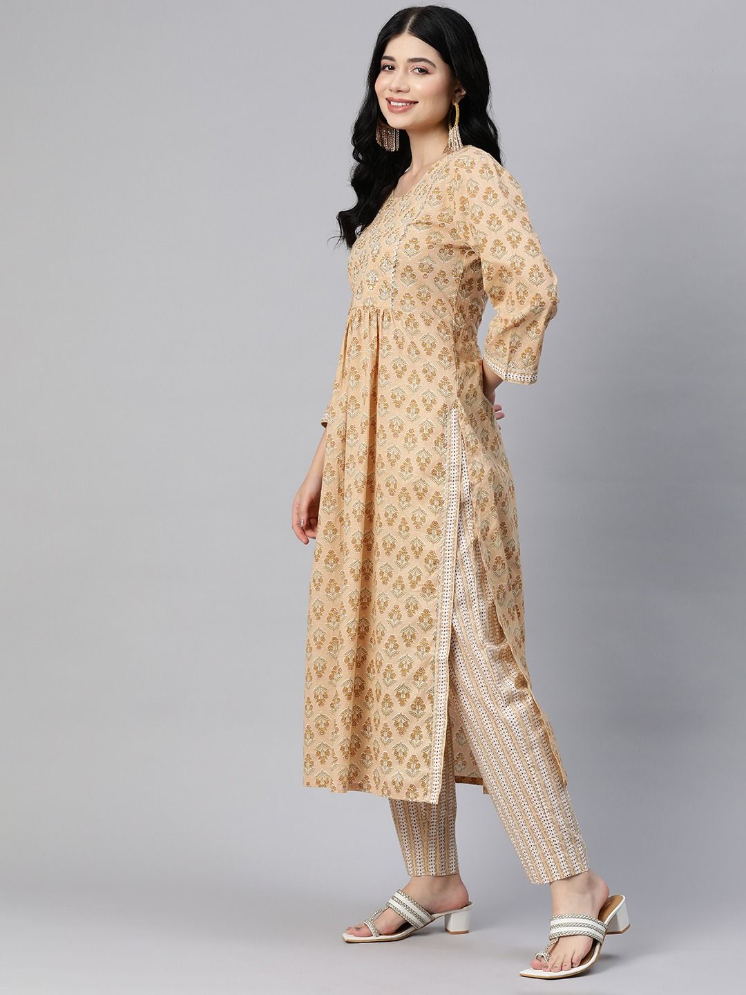 Flared Style Cotton Fabric Peach Color Kurta With Bottom