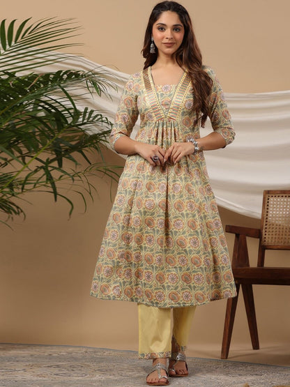 Flared Style Cotton Fabric Yellow Color Kurti With Bottom
