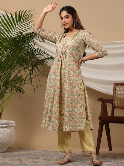 Flared Style Cotton Fabric Yellow Color Kurti With Bottom