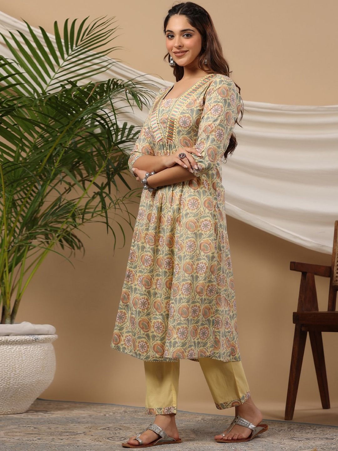 Flared Style Cotton Fabric Yellow Color Kurti With Bottom