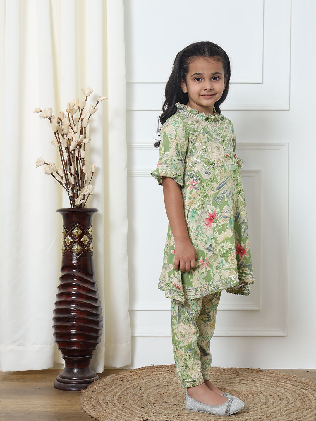 A Line Style Rayon Fabric Green Color Kurti With Pyjama
