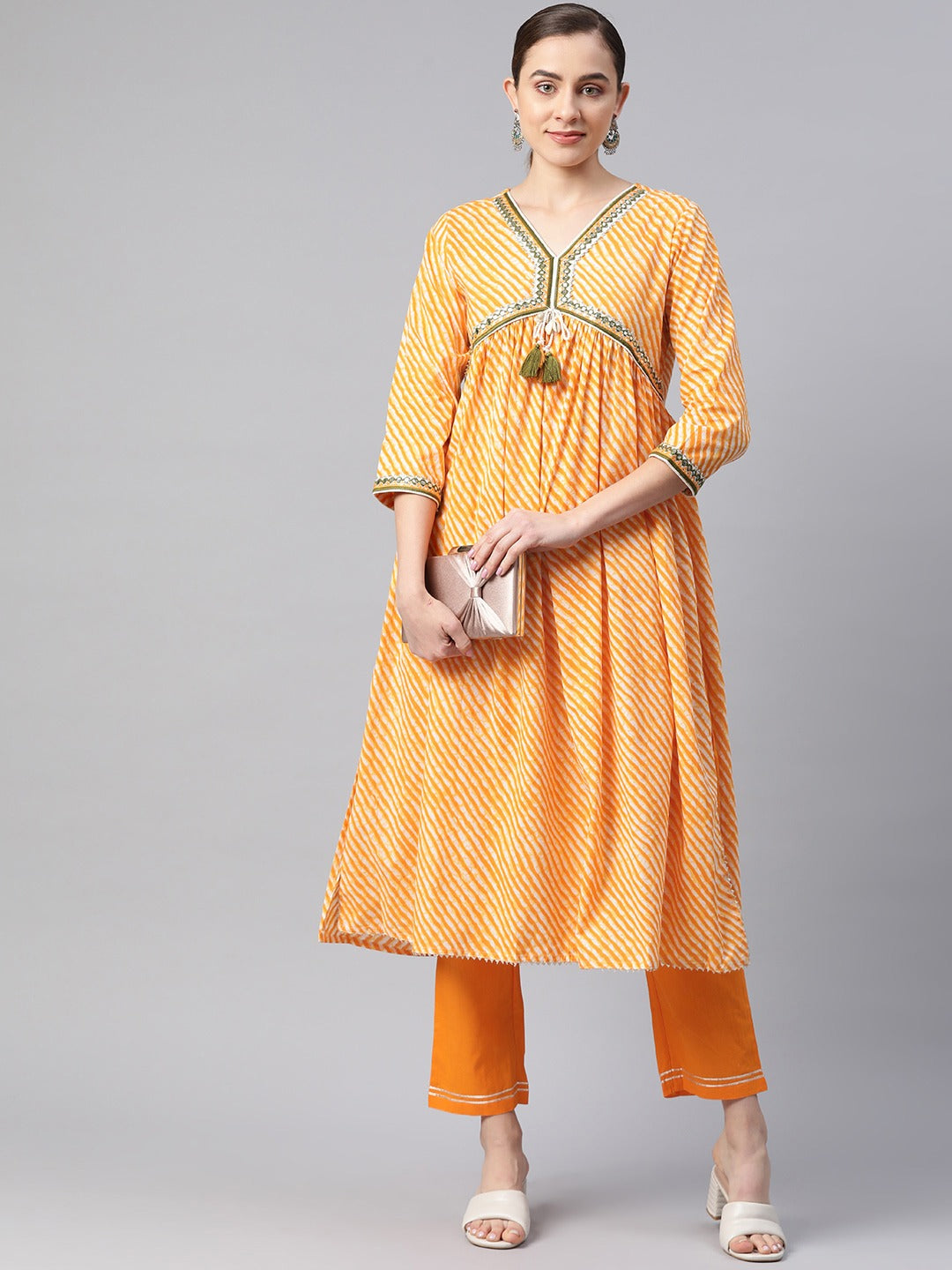 Flared Style Cotton Fabric Yellow Color Kurta With Bottom