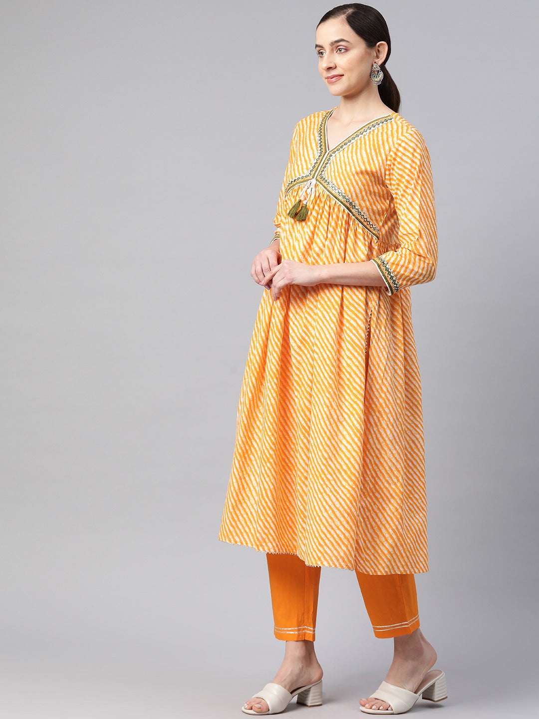 Flared Style Cotton Fabric Yellow Color Kurta With Bottom