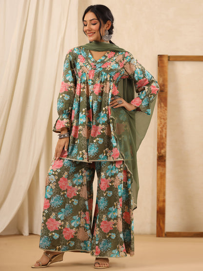 Flared Style Cotton Fabric Green Color Kurta And Bottom With Dupatta